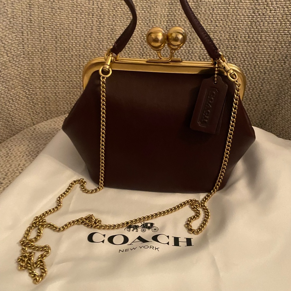 Coach  kisslock bag 16 burgundy/wine Leather Clutch with Gold Accents